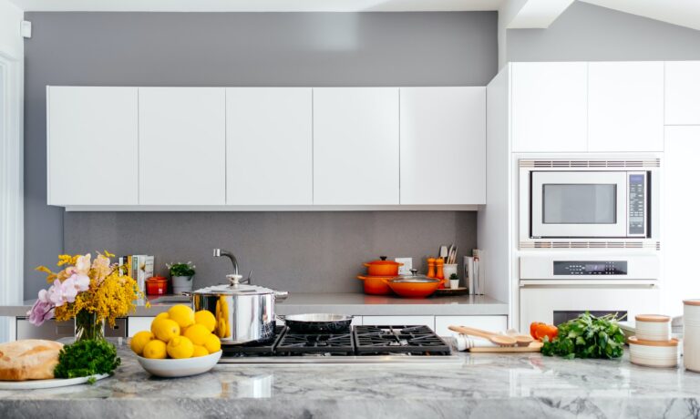 renovated kitchen with fruit bowls and pots and pans